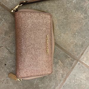 Michael Kors rose gold wristlet wallet